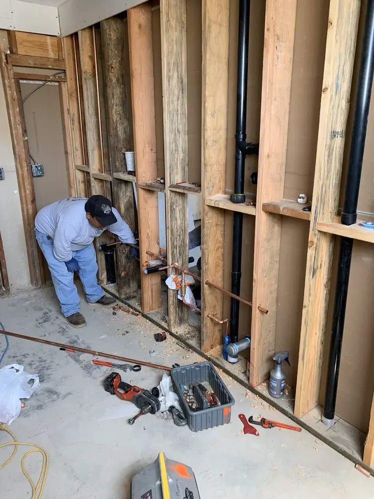 Commercial rough-in plumbing for Water Heater Replacement in Irving Heritage District